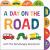 A Day on the Road with the Very Hungry Caterpillar : A Tabbed Board Book